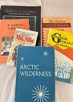 Front group shot of seven Alaska-themed books