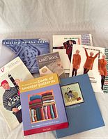 All seven items arranged together showing covers