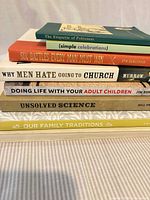 Stacked spines of all seven books showing titles and condition