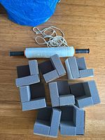 Overall lot showing foam protectors, wrap dispenser, blue bag