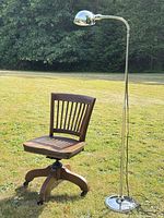Overall view of chair and lamp outdoors