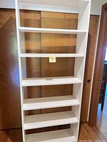 front view of white Billy bookcase with six shelves