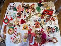 Full overhead view showing entire assortment of ornaments on fabric backdrop