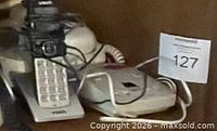 Close-up of VTech handsets and base with cords