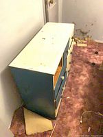 Angled top view showing dresser condition, missing drawer and surface wear