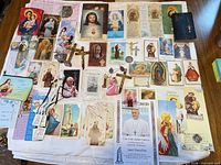 Overall view of all devotional items spread on cloth