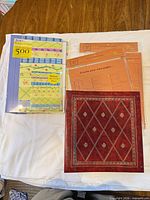 Album, sealed pocket refill pack, sealed cardstock refill pack laid out
