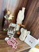 All six devotional items displayed together on shelf