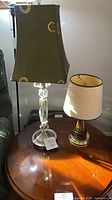 Both lamps on round table showing overall appearance