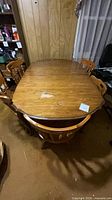 Top view of full dining table and surrounding chairs