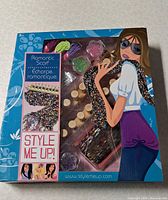 Front of Style Me Up Romantic Scarf kit box showing contents layout