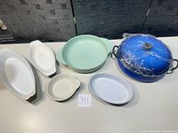 Overview of all six pieces laid out on table