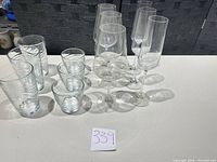 All 12 glass pieces grouped on table