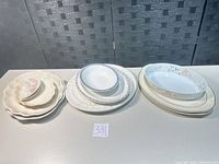 Overall lot showing groupings of plates, bowl and platters