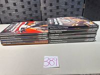 Stack of fourteen Black & Decker Home Improvement Library hardcovers showing spines