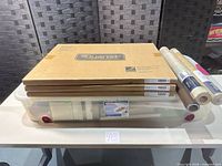 Overall lot showing three Quartet boxes, three vinyl rolls, Sterilite tub