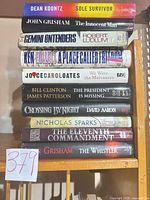 Stack of all ten hardcover books with visible spines