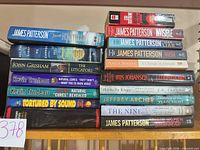 Two stacks showing all seventeen book spines for title and author verification