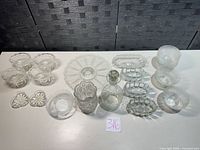 All 26 pieces arranged on table showing variety
