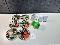 Full lot showing six plates, swan vase, shakers, glass pepper