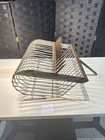 Full view of bull rake head showing basket and tines