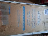 Damaged retail box showing model, size range, color and branding