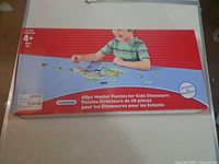 Front of Kid Connection dinosaur puzzle box