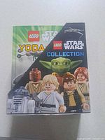 Front of slipcase with LEGO Star Wars Yoda graphic