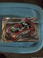 Top view of ProBuilder Racing Series tin with car graphic