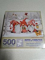 Front of sealed Bits and Pieces puzzle box showing artwork and 500-piece count