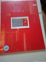 Front view of sealed red Browne cutting board