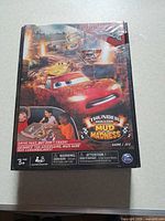 Front of sealed Thunder Hollow Mud Madness board game box