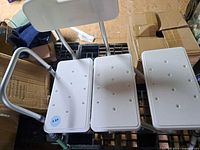 Top view showing three white seat panels, backrest, armrest