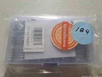 Front of sealed organizer box showing labels Made in China and QitinDasen brand