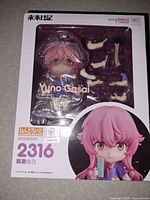 Front of boxed Nendoroid showing figure and accessories