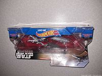 Front/top view of sealed blister showing Hot Wheels logo and X-Wing vehicle