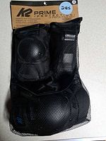 Front view of sealed K2 Prime Protection pad set in mesh bag