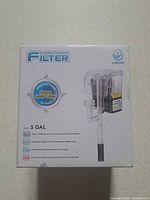 Front of box showing LaQual external hanging filter for 5-gallon aquariums