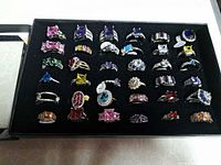 All 36 rings arranged in black display tray