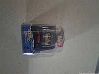 Front view of sealed Ant-Man Mighty Muggs figure in clear plastic tube