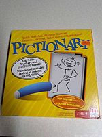 Front of sealed Pictionary box