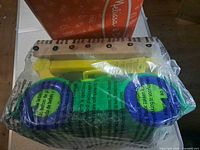 Toy in sealed plastic bag with parts visible
