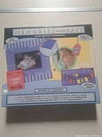 Front of boxed Memories Made Easy scrapbook kit