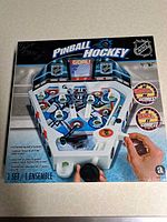 Front of boxed NHL Pinball Hockey game set