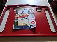 Tray with packaging sheet on tabletop