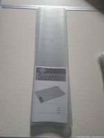 Rolled gray PetSafe ScatMat training mat