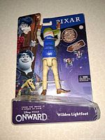 Front view of sealed Wilden Lightfoot figure with sprite accessories visible