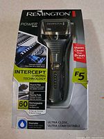 Front of boxed Remington F5 shaver showing model, intercept technology and 60-minute runtime