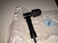 Adapter in plastic bag showing full form