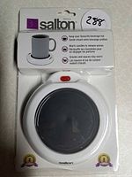 Front view of sealed Salton mug warmer blister pack